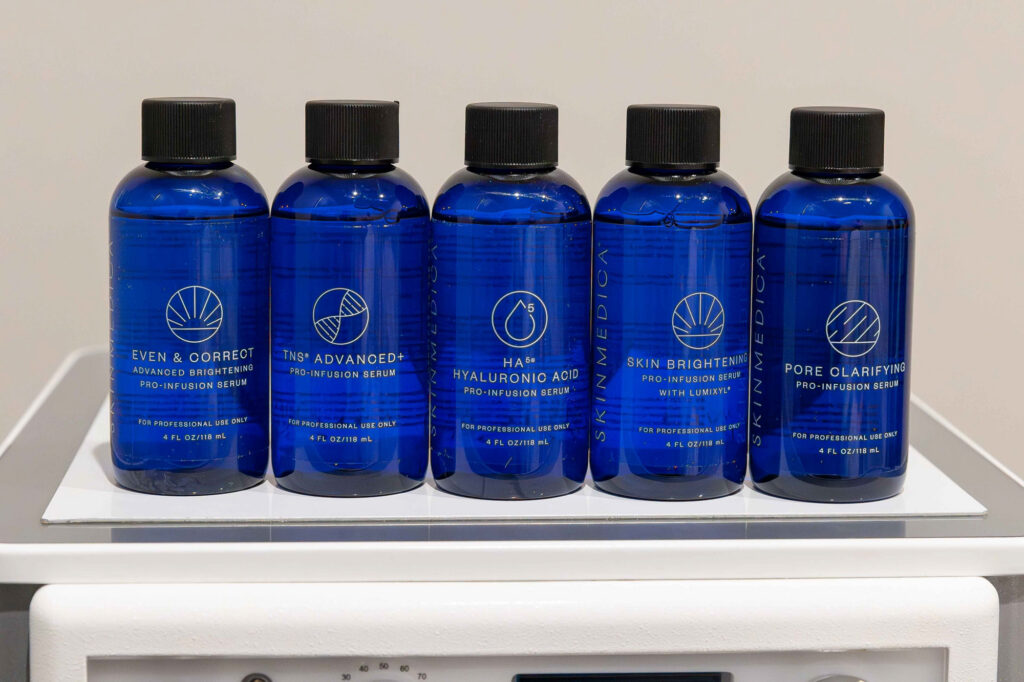 SkinMedica bottles of serum used during a DiamondGlow facial near Durant, OK.